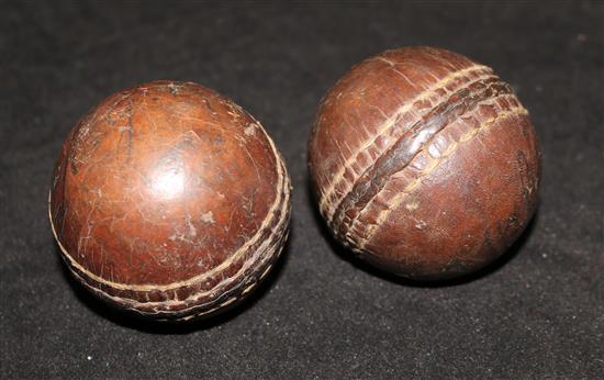 Two 19th century stitched leather balls, probably for stoolball, one inscribed G H C 1845
